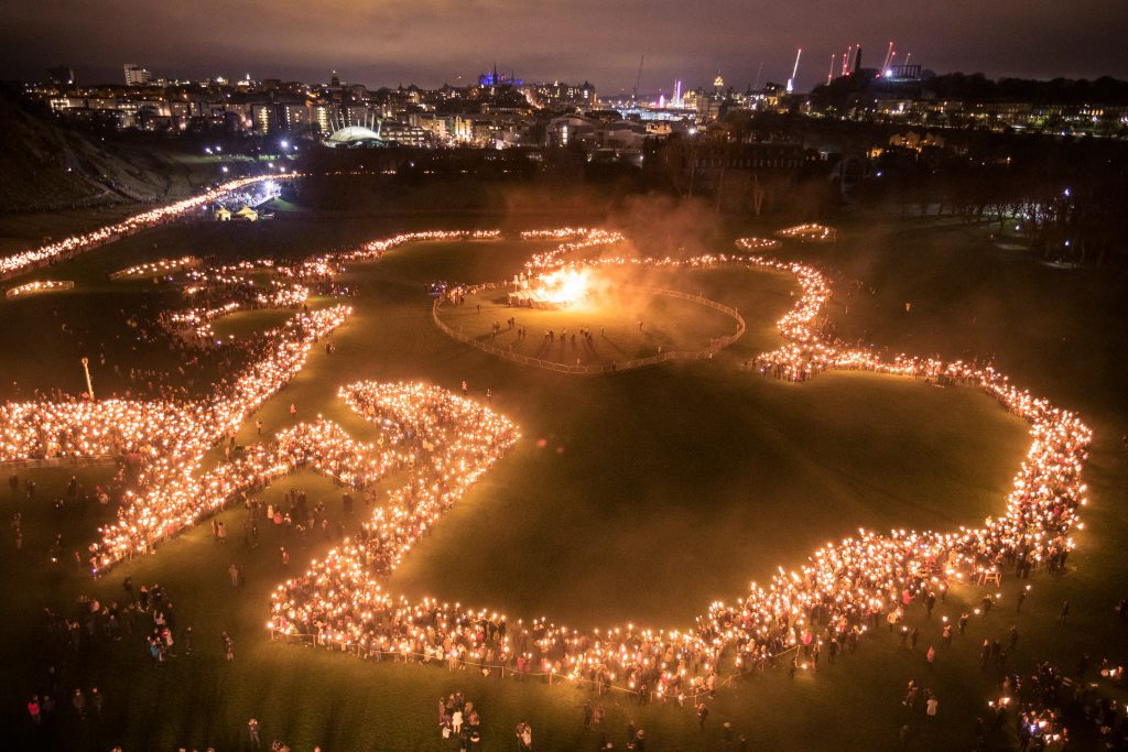 Torchlight Procession ended in Outline of Scotland to open Edinburghs Hogmanay Photo by TimEdgeler 001 Hogmanay Torchlit Procession Scotland Map