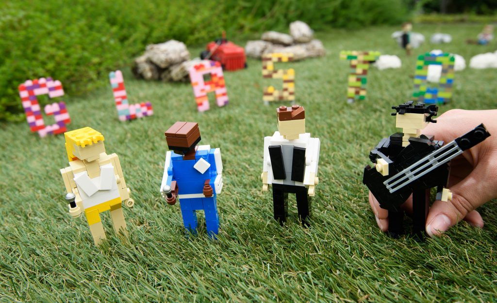 LEGOLAND PRESS HANDOUT MINILAND GLASTONBURY 2019 18 Lego Glastonbury Headlines Kylie, Stormzy, Brandon Flowers and Robert Smith appear next to the Glastonbury sign.