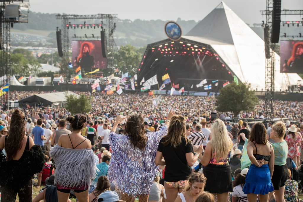 2019Festival AnnaMatt 159 Watching the Glastonbury line-up on the Pyramid Stage from the crowd