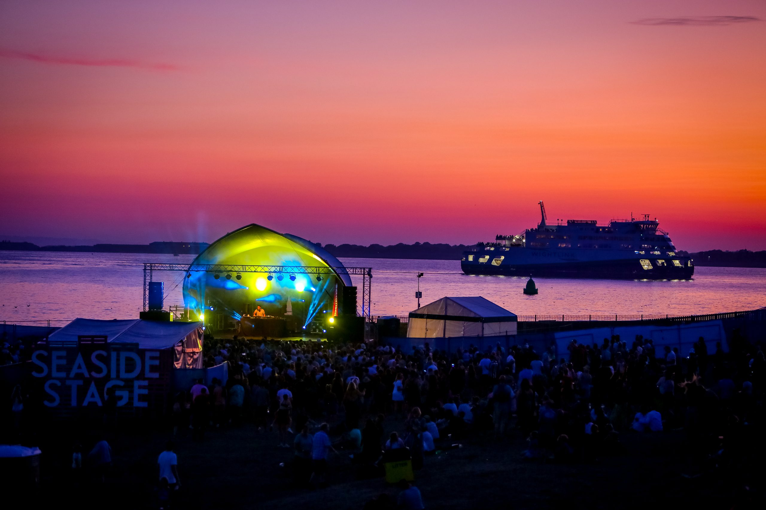 Victorious Festival seaside stage ferry sunset