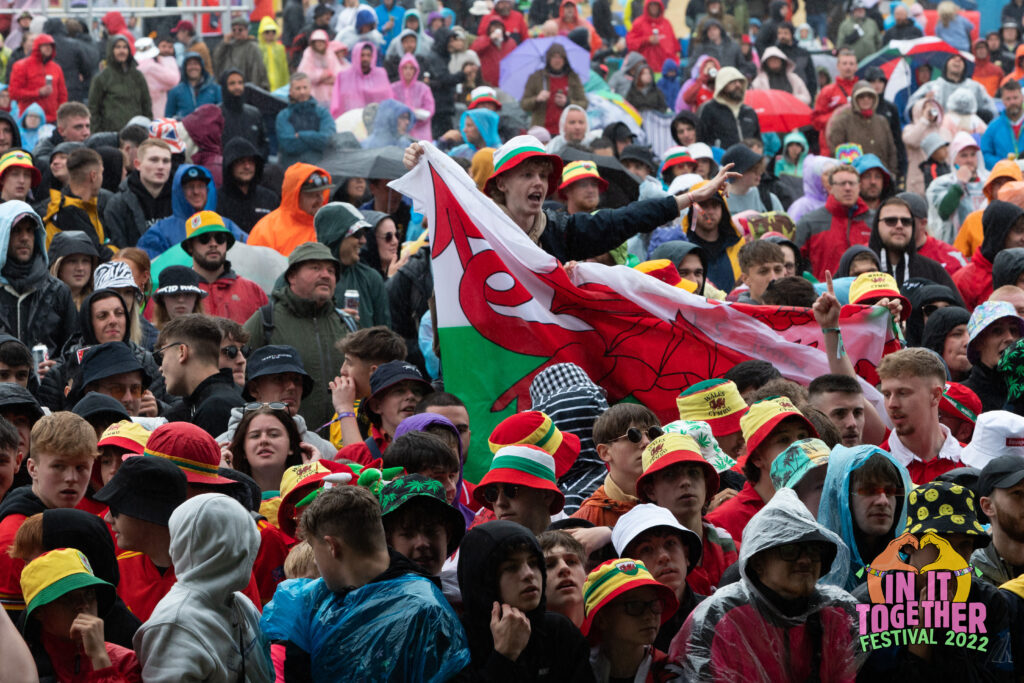 In It Together Festival crowd wales flag bucket hats