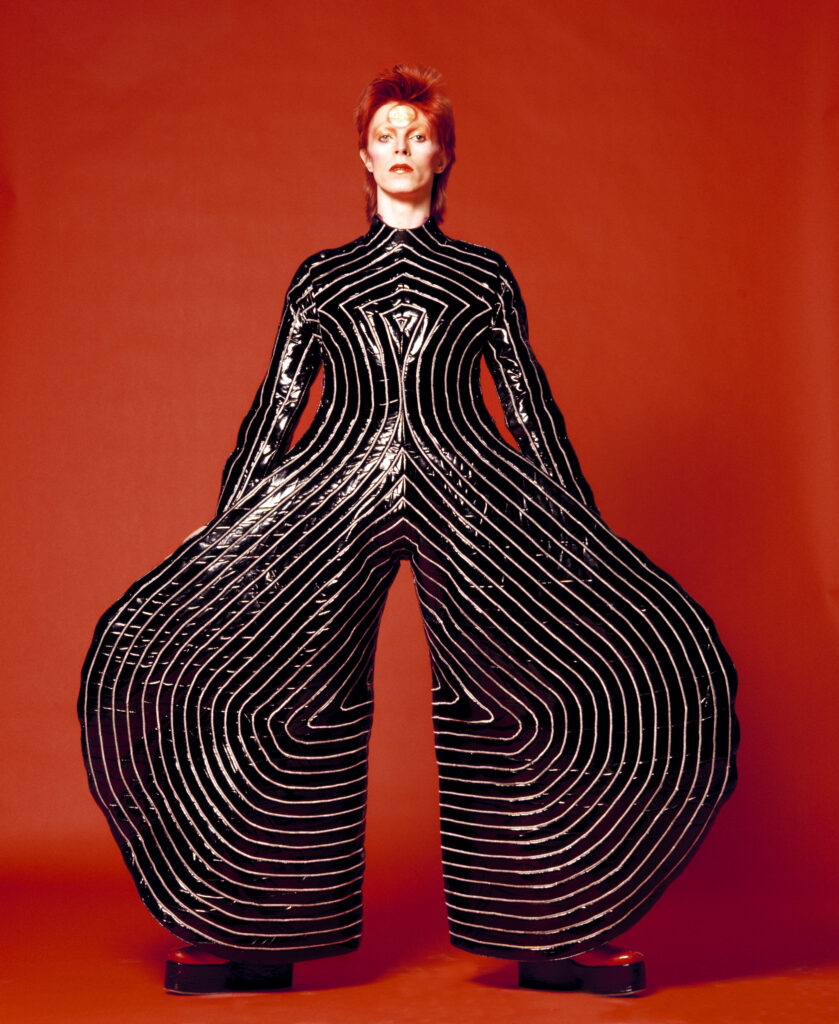 Striped bodysuit for Aladdin Sane tour 1973 Design by Kansai Yamamoto Photograph by Masayoshi Sukita © Sukita The David Bowie Archive 2012 Striped bodysuit for Aladdin Sane tour, 1973 Design by Kansai Yamamoto Photograph by Masayoshi Sukita © Sukita The David Bowie Archive 2012