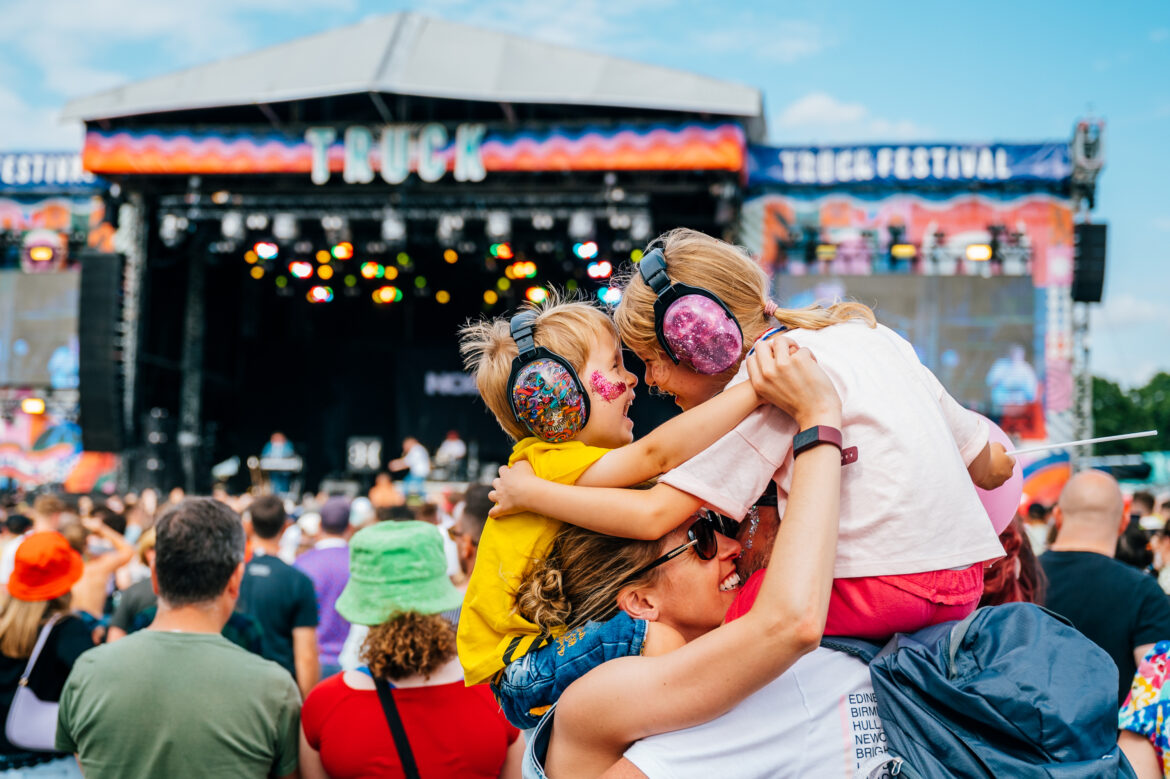 Truck Festival main stage crowd child on shoulders