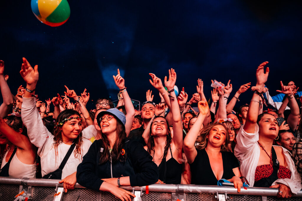 Truck Festival crowd at barrier in tent