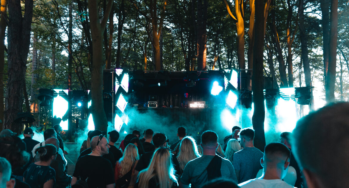One in the Woods stage in trees