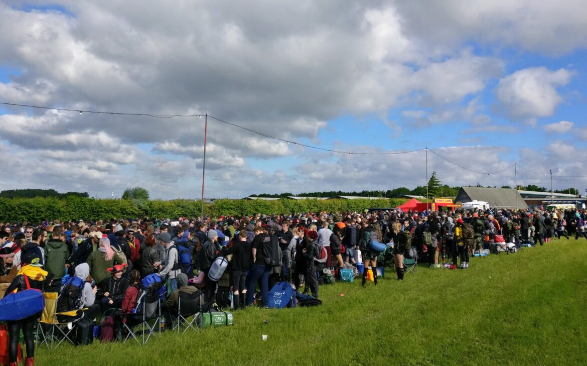 Download campsite queue with festival bags