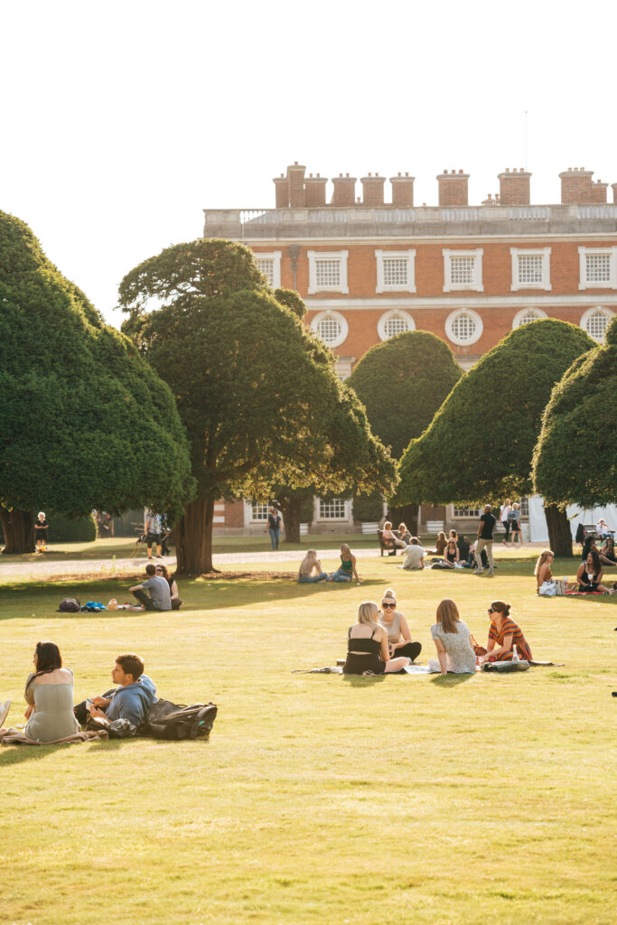 McFly Hampton Court Palace Festival Joshua Atkins 23 Hampton Court Palace Festival people sitting on grass
