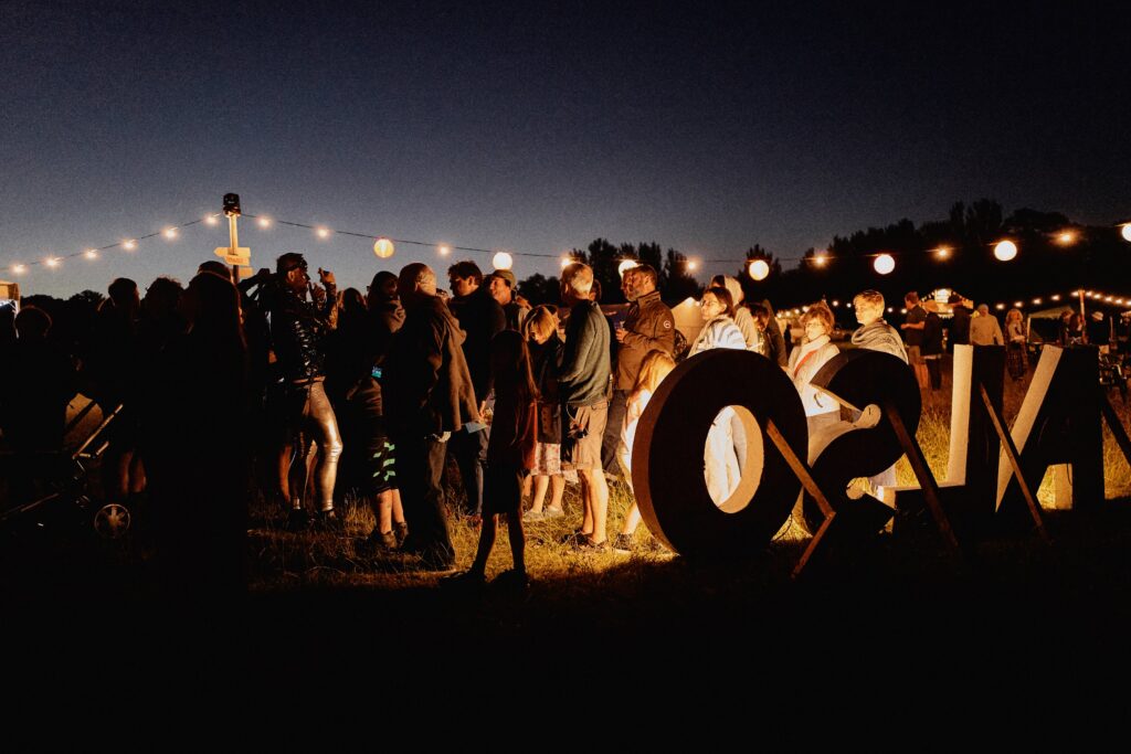 ALSO 18.407 Also Festival sign at night