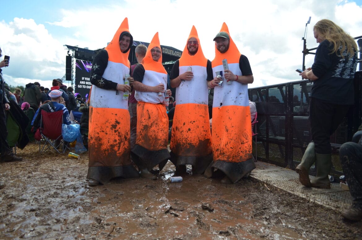 Traffic cone people in the mud at Download 2024 at donnington park