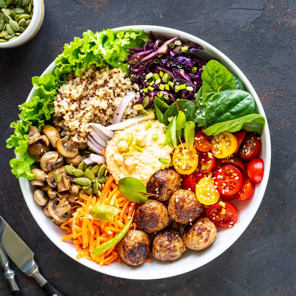 grilled chicken rice spicy chickpeas avocado cabbage pepper buddha bowl grilled chicken rice spicy chickpeas avocado cabbage pepper buddha bowl