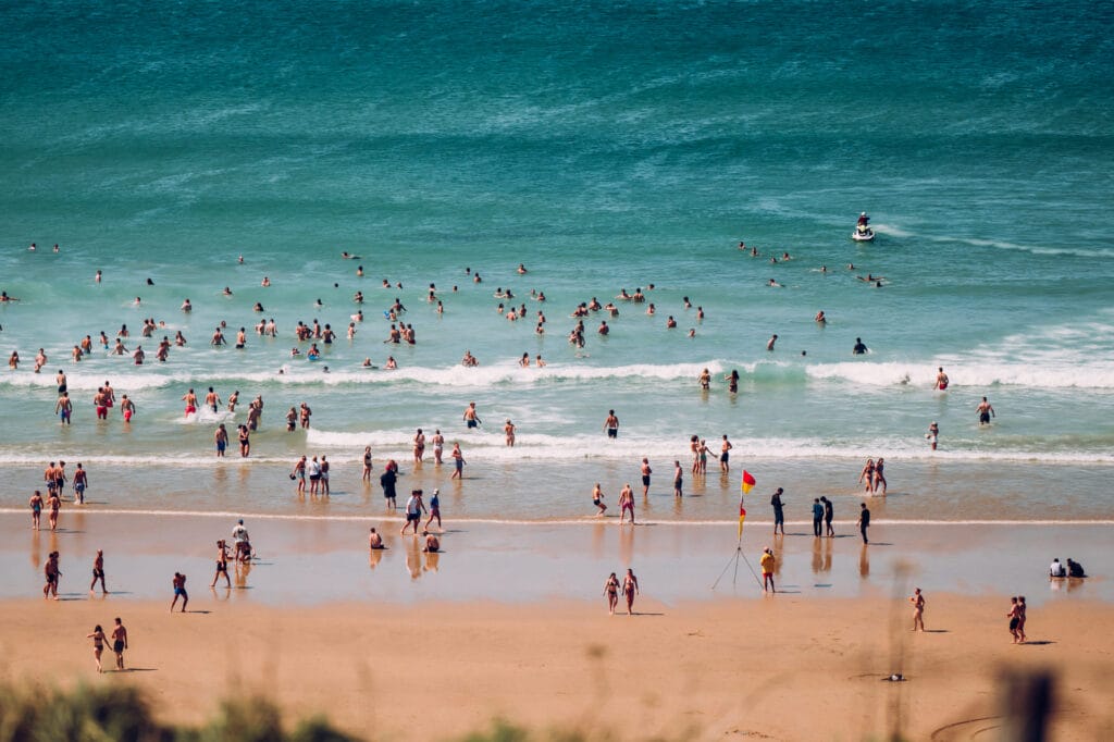 People on the beach at Boardmasters