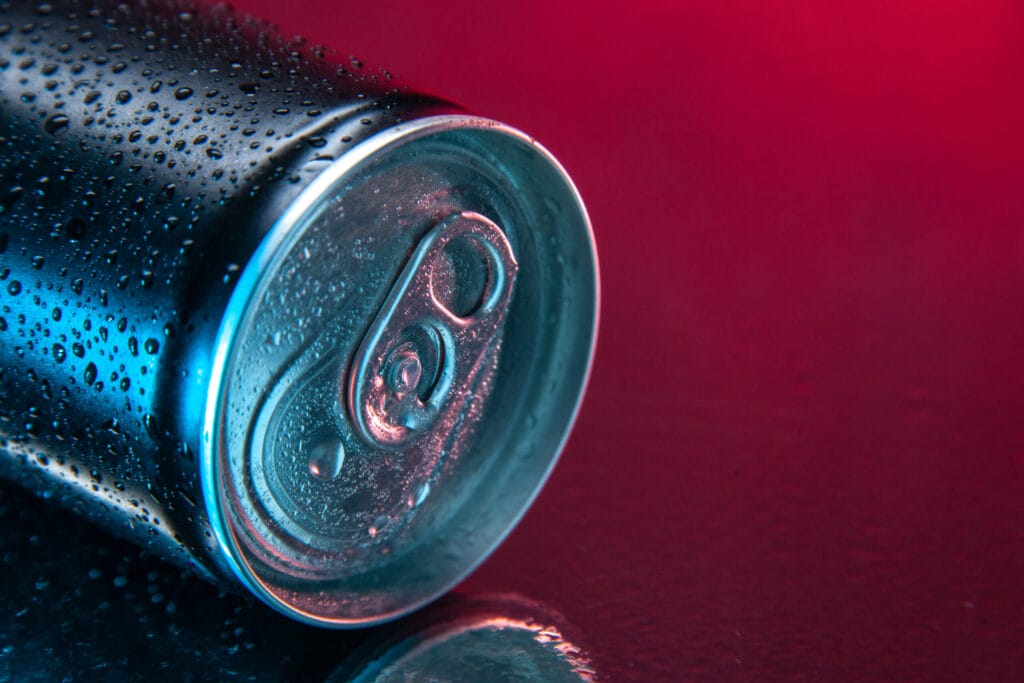front view energy drink can dark pink background color water soda darkness drink