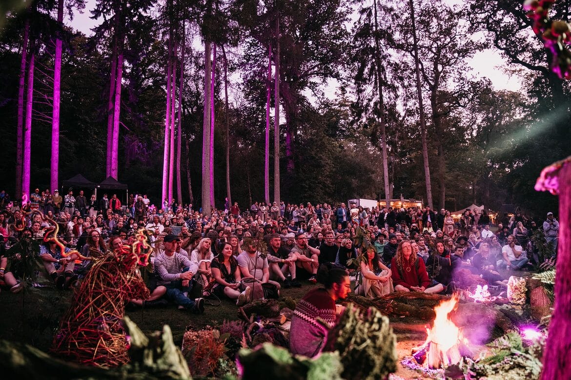 Solstice at Wasing crowd watching in forest