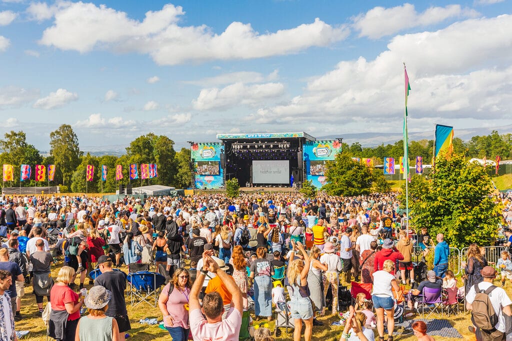 Kendal Calling crowd at main stage in the sun