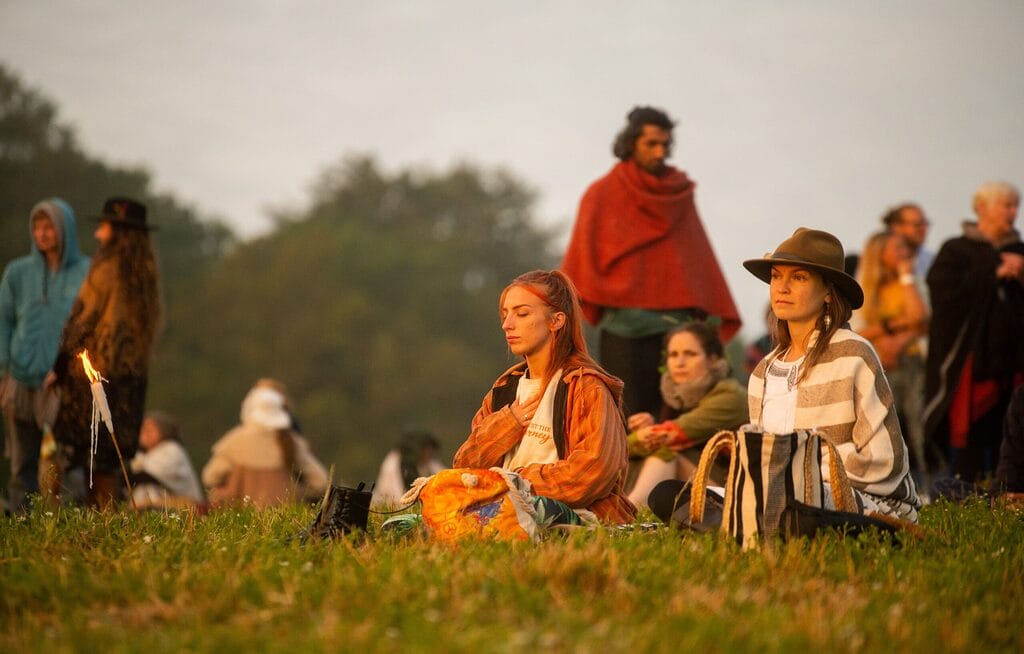 People sitting at Solstice at Wasing Sunrise Ceremony
