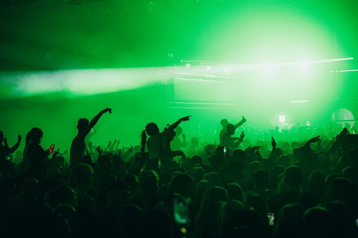 Terminal V crowd on shoulders green lights