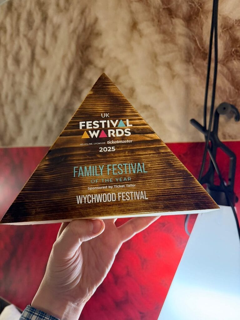 Wychwood award Wychwood Festival's trophy for winning Family Festival of the year at the UK Festival Awards 2025